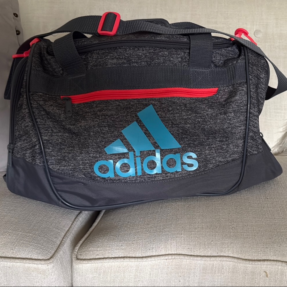 Adidas Gray and Red Duffel Bag with Sporty Design